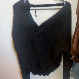 Akira black sweater in size small/medium.In great condition!